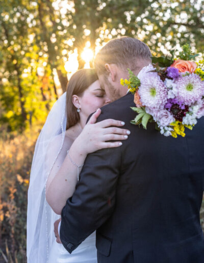 Littleton wedding photographer in Colorado in the fall leaves