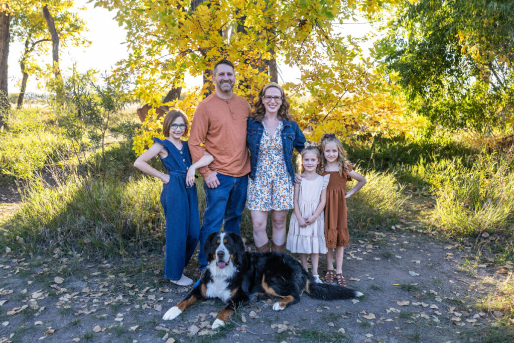Littleton family photographer in Colorado with fall leaves