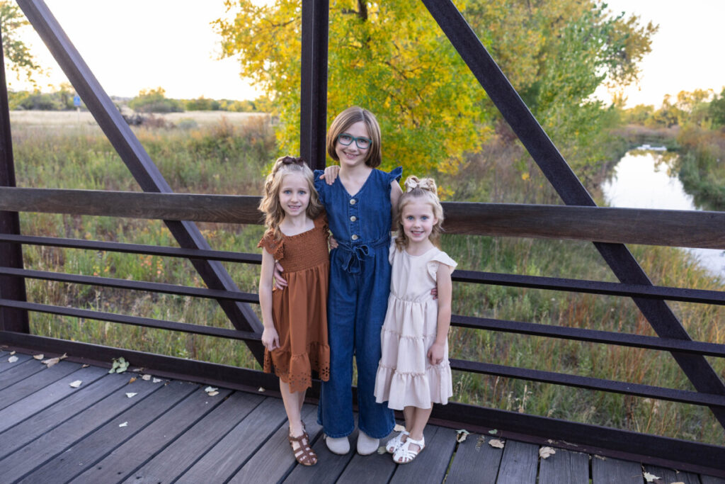 Colorado child and family photographer near water at sunset
