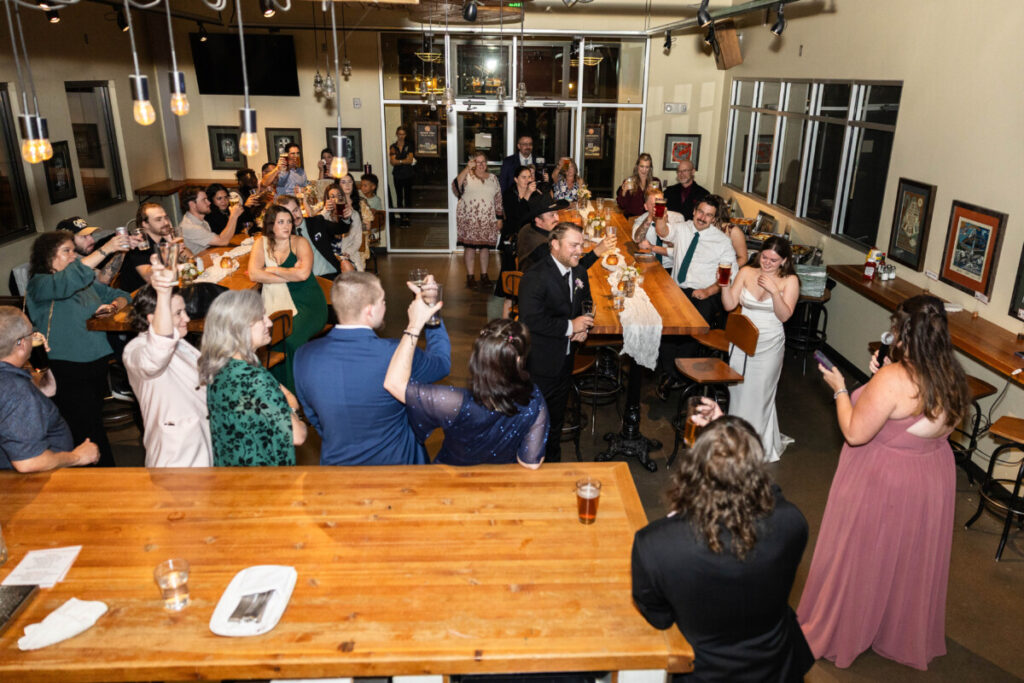 Littleton wedding photographer reception and toasts at Breckenridge Brewery